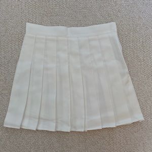 white pleated skirt